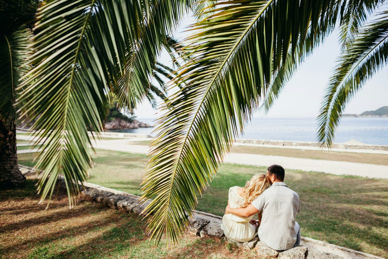 lovely couple relax on beach together